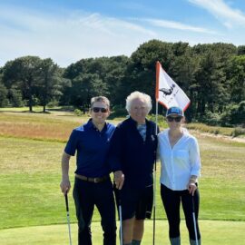 Neil w Guy and Kelsey on golf course