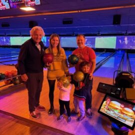 family at bowling alley