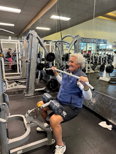 Neil lifting weights